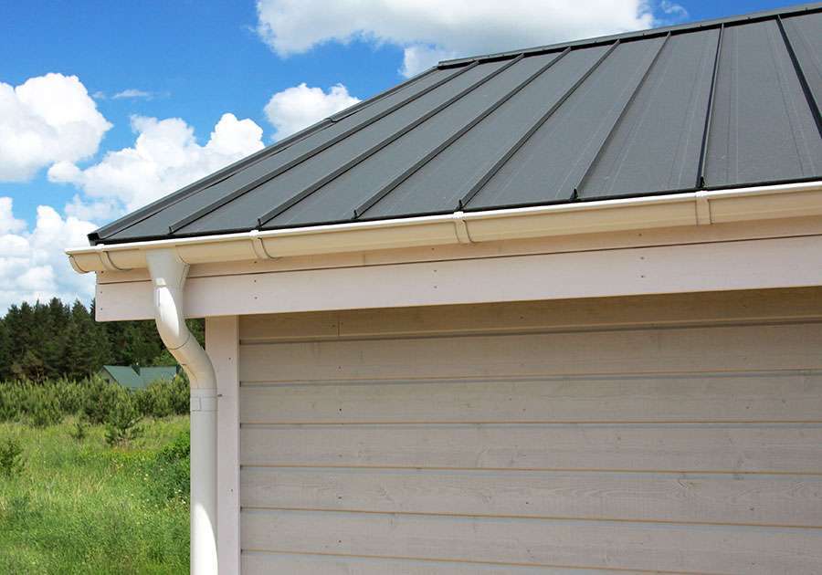 Metal roof with gutters