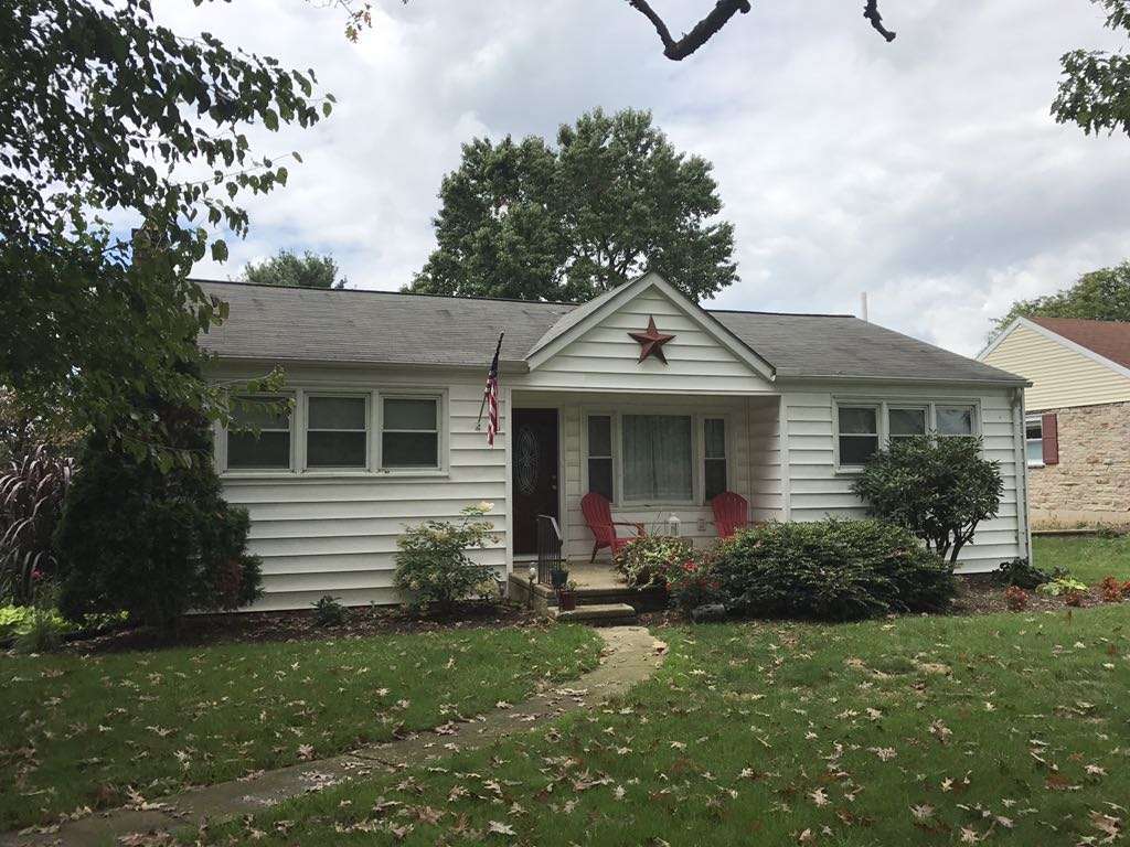 Before replacement siding damage