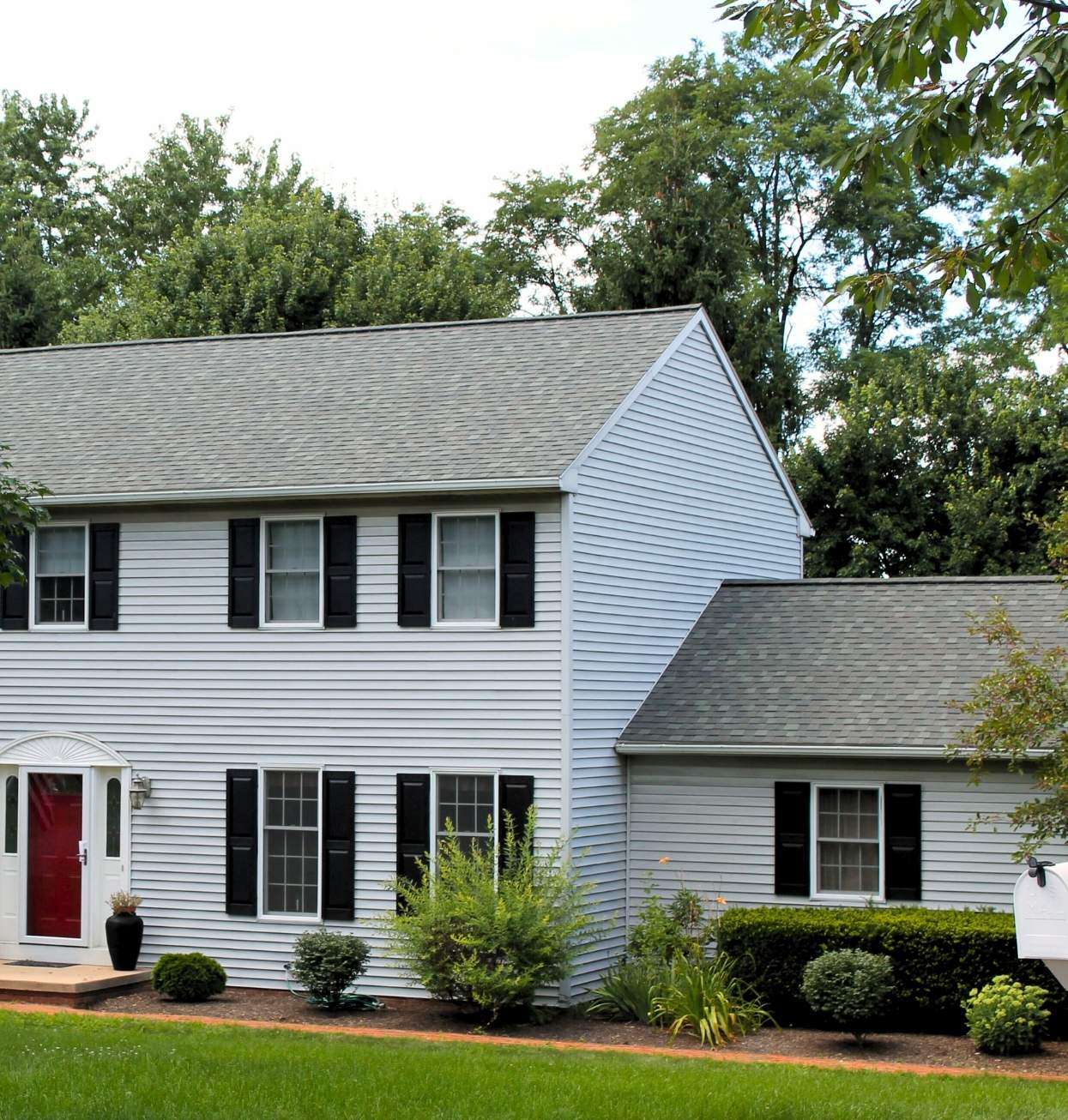 Light blue vinyl siding on a new home